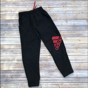 Red and Black adidas fleece sweatpants